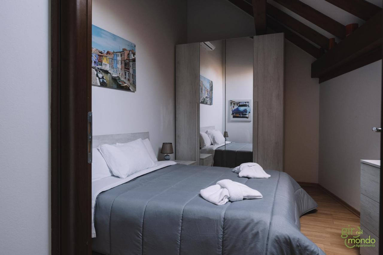 Giro Nel Mondo Apartments Катания Экстерьер фото