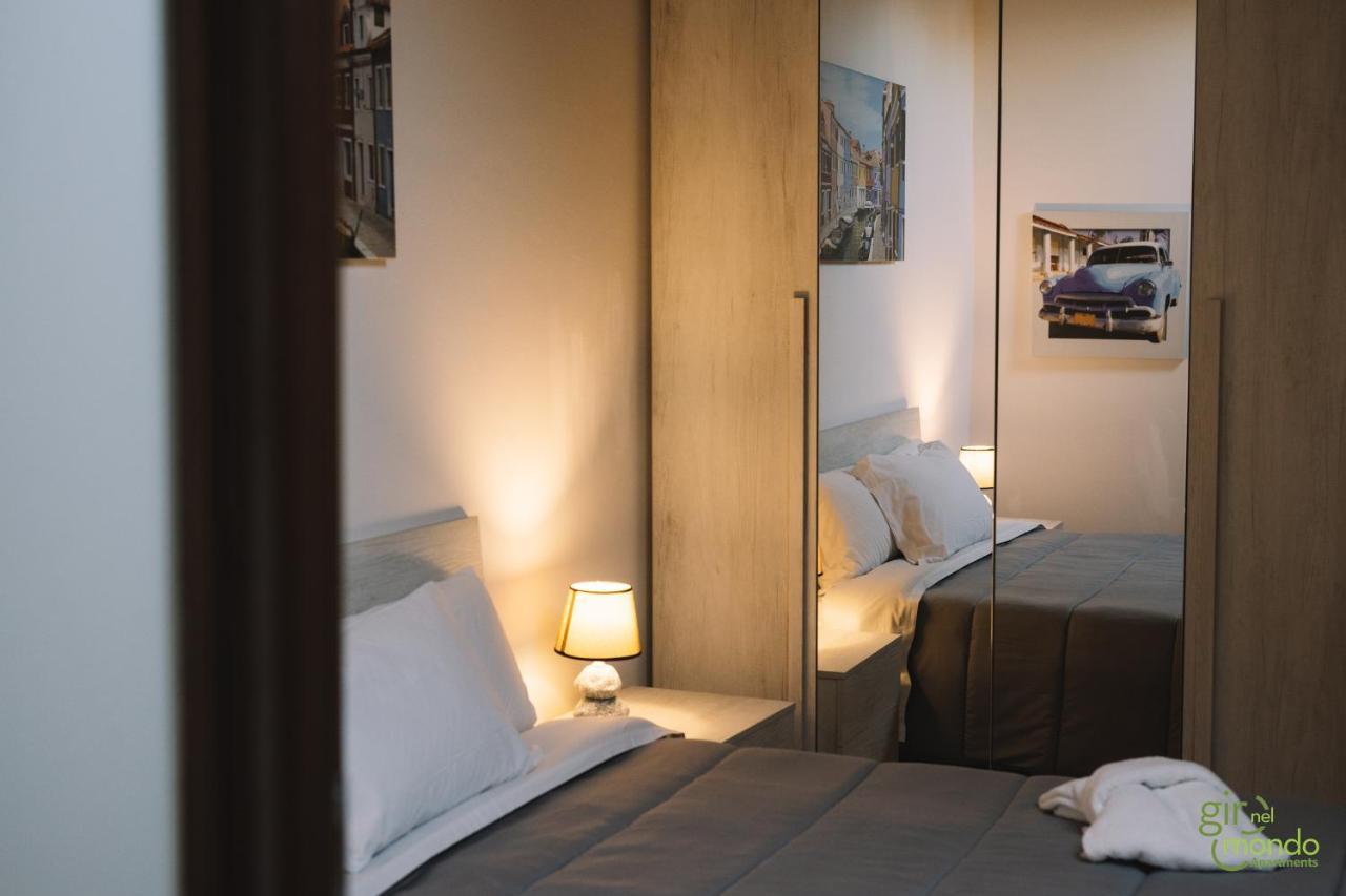 Giro Nel Mondo Apartments Катания Экстерьер фото