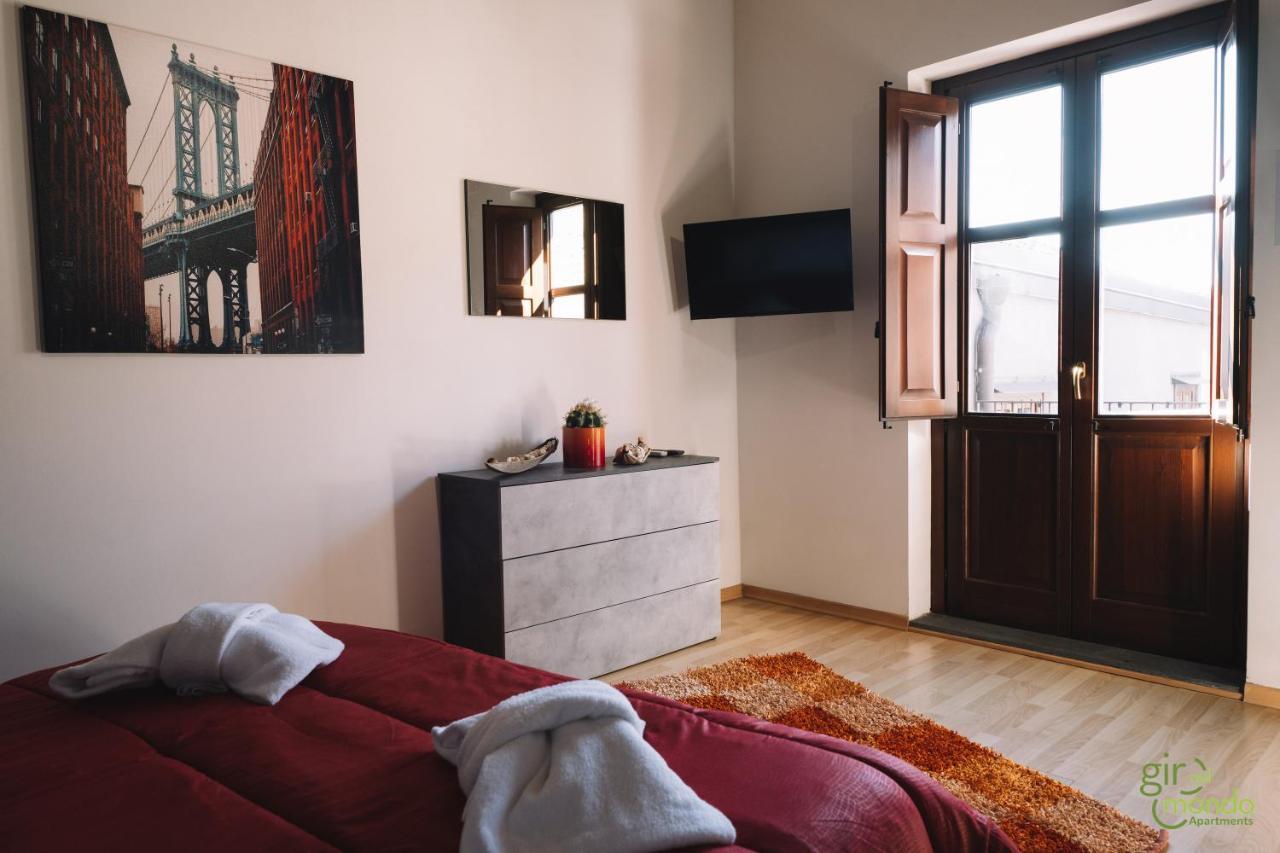 Giro Nel Mondo Apartments Катания Экстерьер фото
